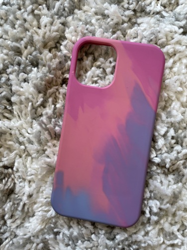 A pink and purple tie-dye patterned phone case for iPhone 12. 