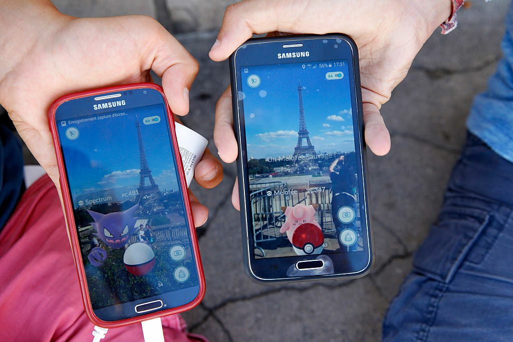 People playing 'Pokemon Go' in Paris