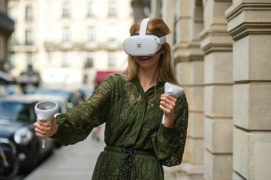 Woman using Oculus Quest outdoors