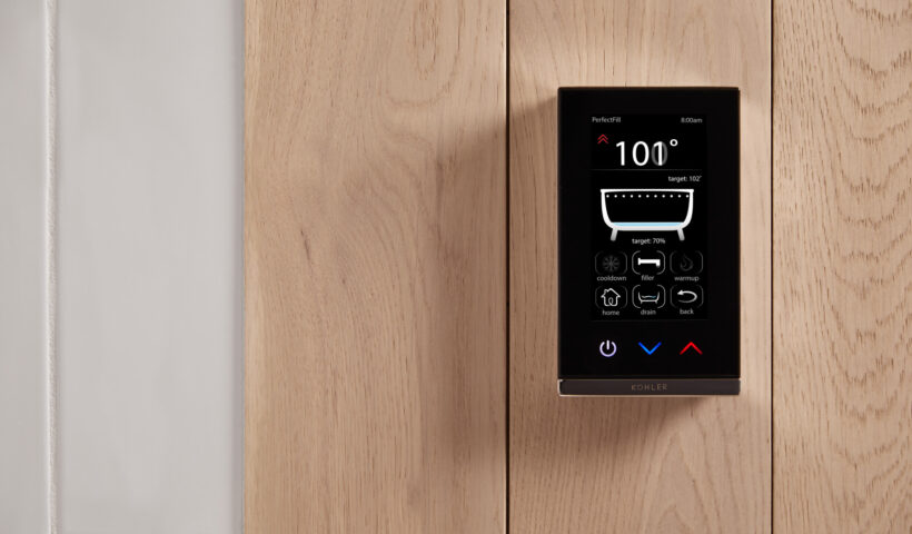 A digital interface mounted on a bathroom wall shows the PerfectFill system.