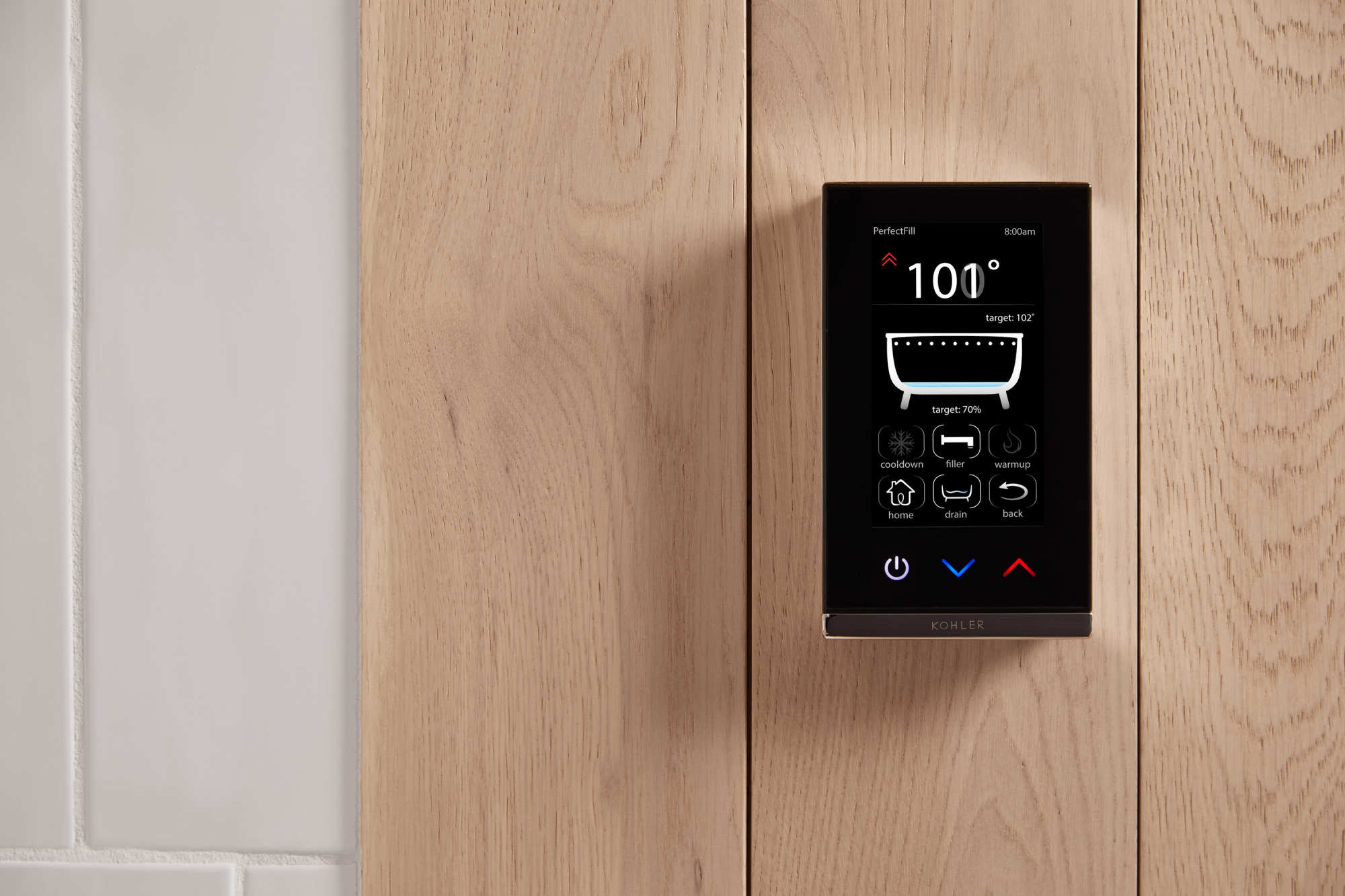 A digital interface mounted on a bathroom wall shows the PerfectFill system.