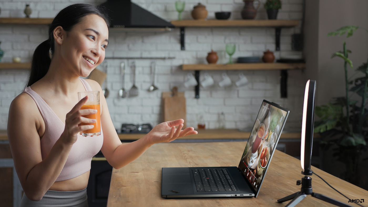 Woman using Lenovo laptop webcam