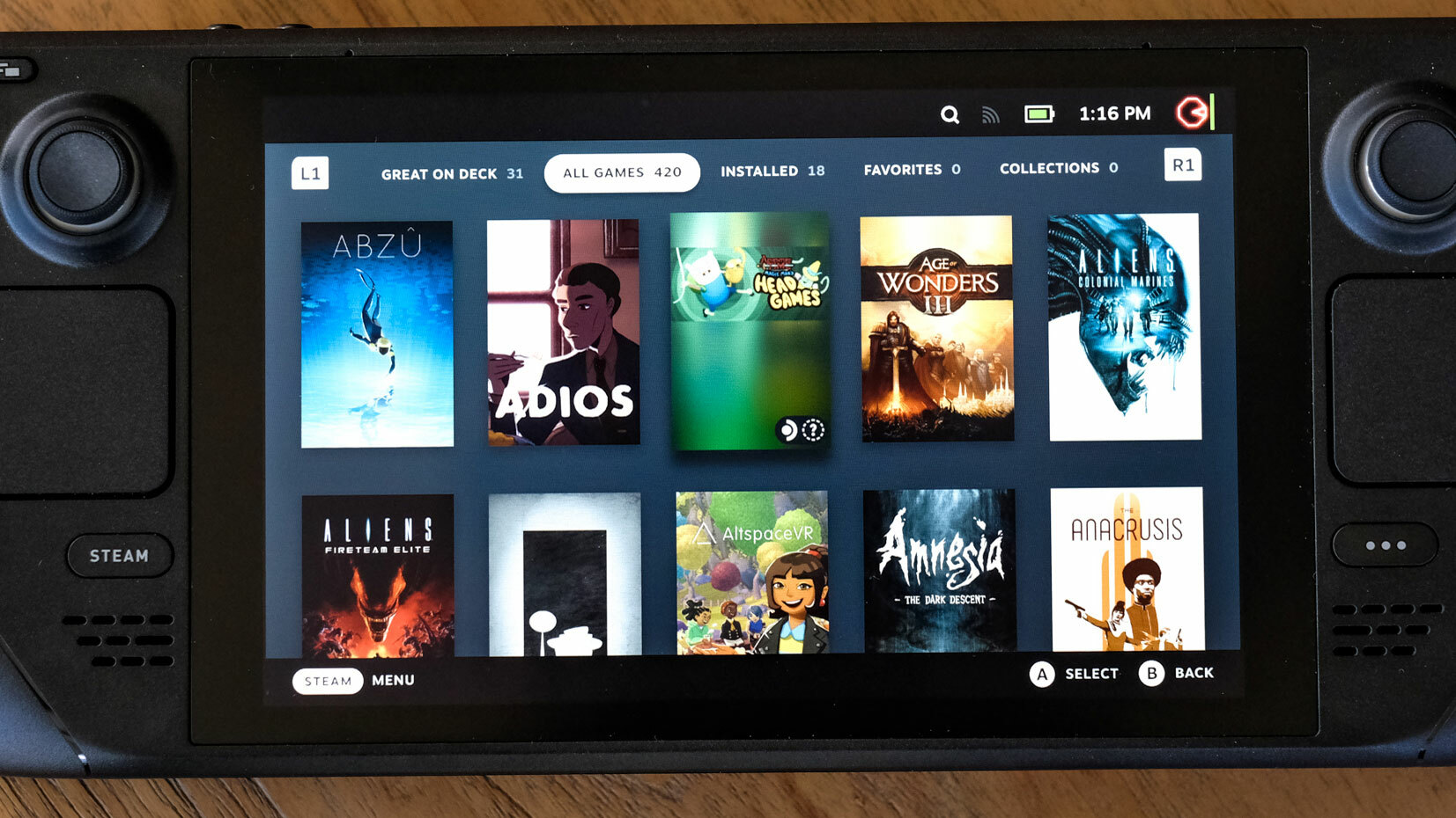 A close-up of the Steam Deck screen. The screen is showing a portion of someone's game library as seen inside SteamOS.