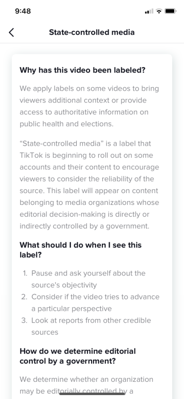 A screenshot of TikTok shows an information portal for state-controlled media.