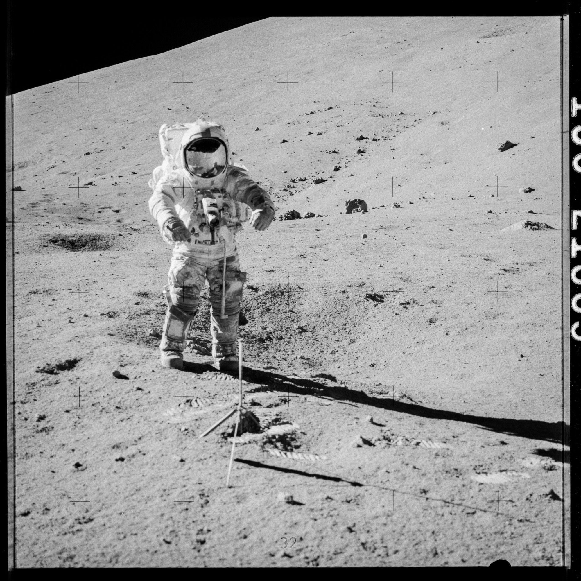 an astronaut collecting lunar samples on the moon