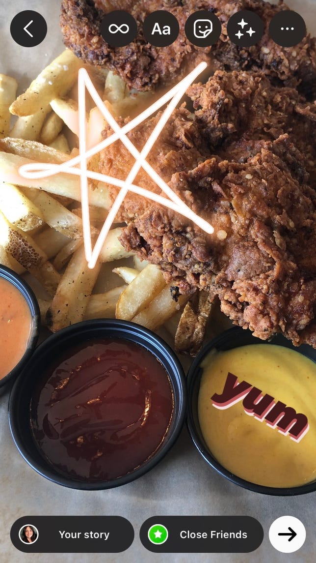 Image of a delicious meal with a drawn star and text that says yum