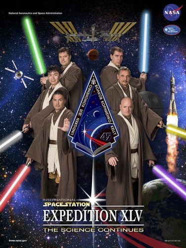 Astronauts posing as Jedi knights