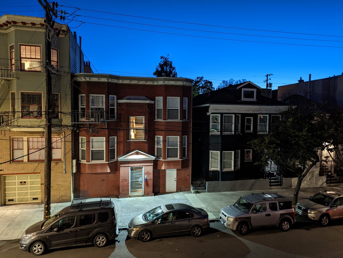 A Night mode photo from the Pixel 6 Pro of a city residential street at night