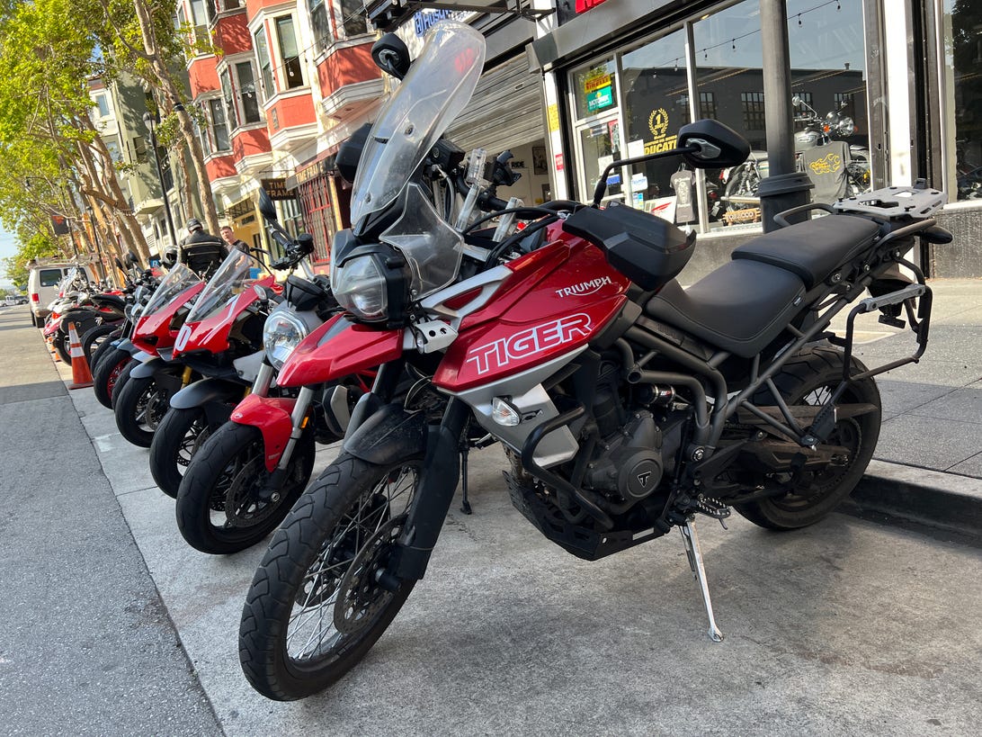 Photo from the iPhone 13 Pro of a bunch of red motorcycles