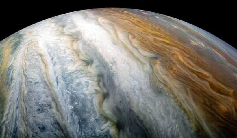 NASA spacecraft zooms over Jupiter's swirling clouds at 131,000 mph